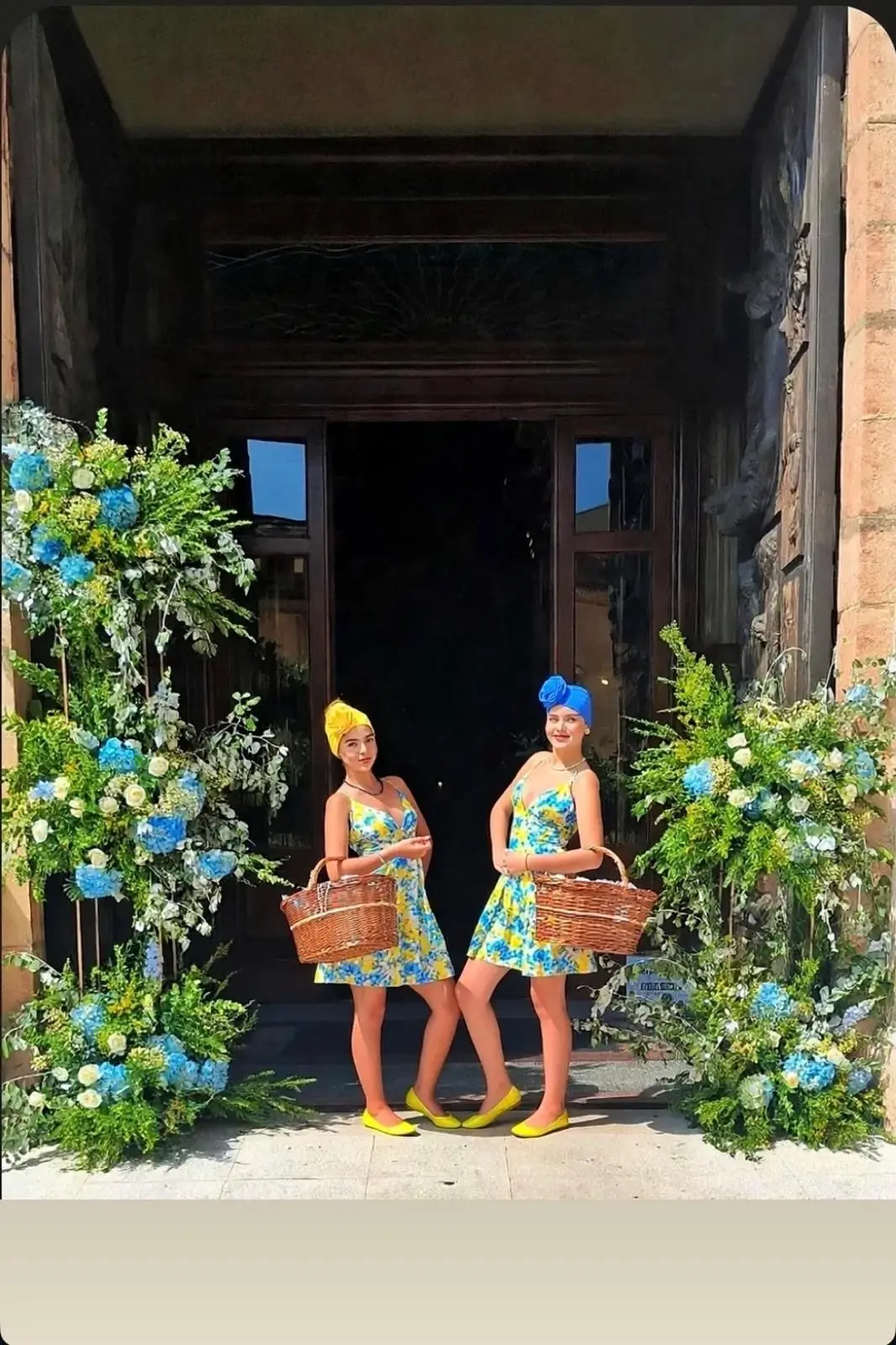 Luxury floral welcome with hosts at an historic destination venue